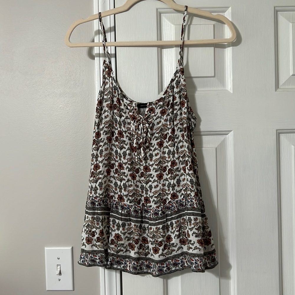 White floral tank top.
